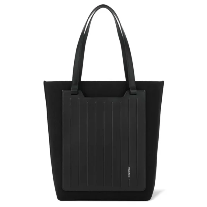 Never Still Vertical aus Leder und Canvas TrageBags Never Still Vertical aus Leder und Canvas TrageBags