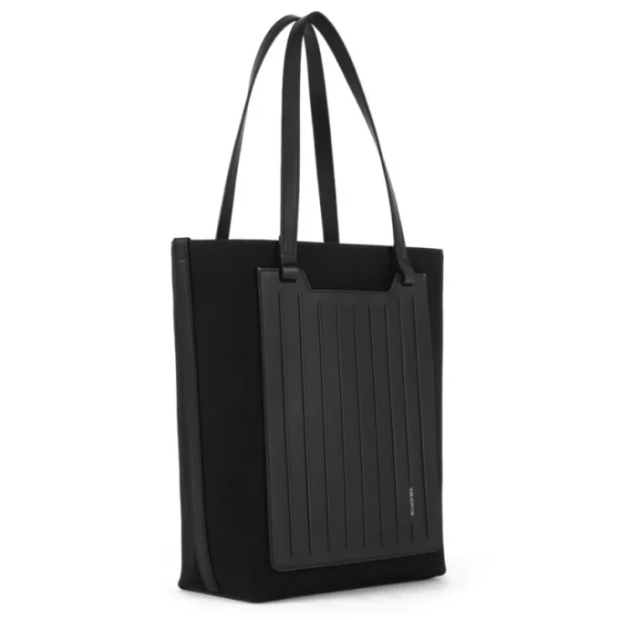 Never Still Vertical aus Leder und Canvas TrageBags Never Still Vertical aus Leder und Canvas TrageBags