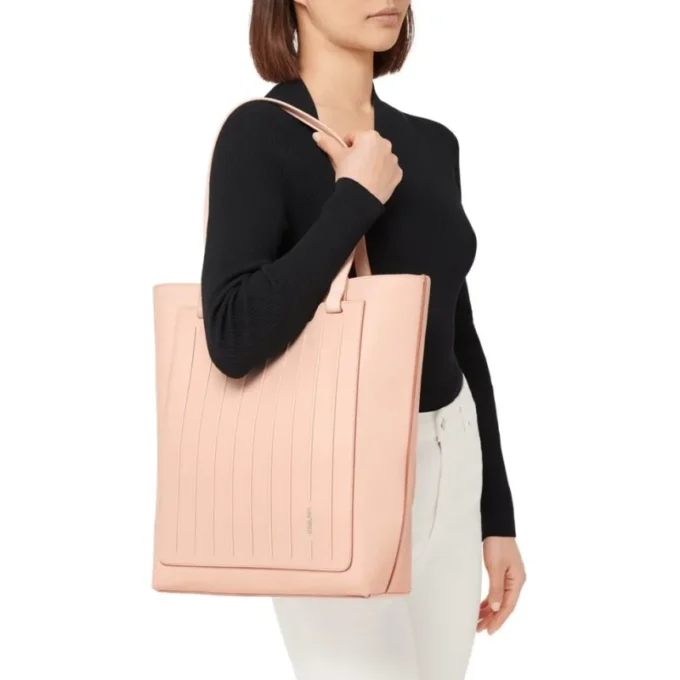 Never Still Vertical aus Leder und Canvas TrageBags Never Still Vertical aus Leder und Canvas TrageBags